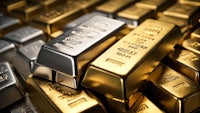 a pile of gold and silver bars