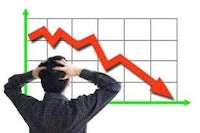 a man looking at a graph with a downward arrow