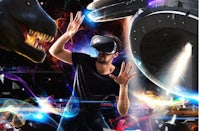a man wearing a virtual reality headset and a dinosaur